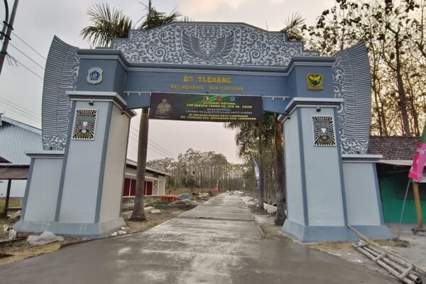 Potret jerih payah anggota satgas TMMD ke 129 dan warga kini buatkan hasil yang maksimal. Rabat Beton TMMD ke-129 Kodim 0812 Lamongan di Desa Tlemang Tuntas, Tinggal Pengurukan Berem