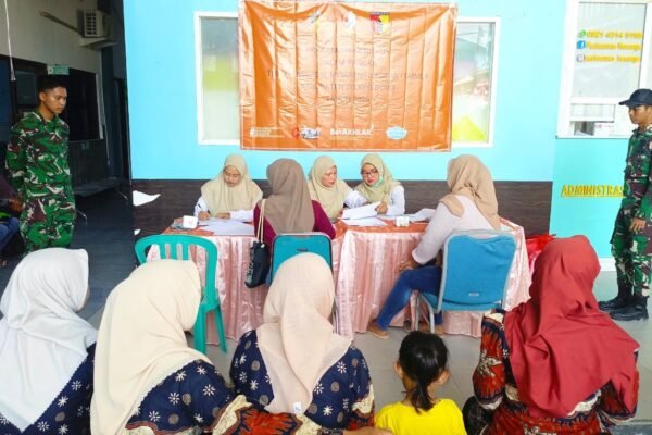 Wujudkan Keluarga Berkualitas: TMMD 129 Bojonegoro Hadirkan Safari KB Gratis