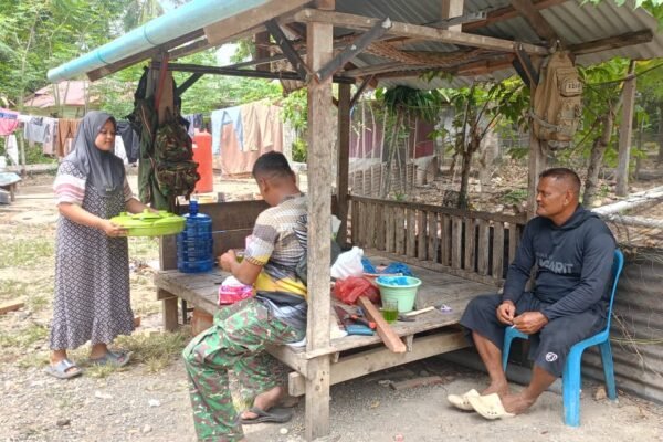 Secangkir Kopi Hangat Pererat Kemanunggalan TNI dan Warga di Lokasi TMMD Ke-129 Kodim 0102/Pidie