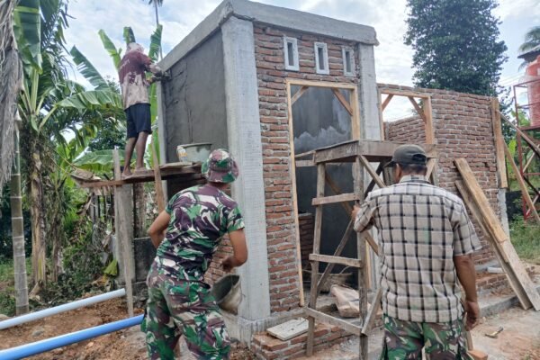 Satgas TMMD dan Warga Percepat Pembangunan MCK di TPU Blang Cot Demi Sanitasi yang Lebih Baik