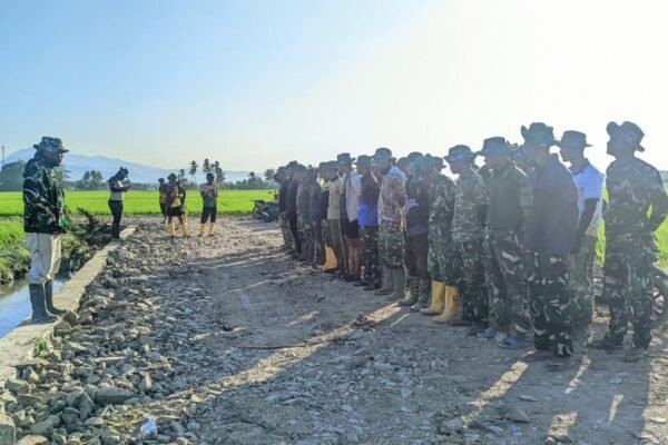 Apel Pagi Satgas TMMD Ke-129 Ditemani Sawah Hijau