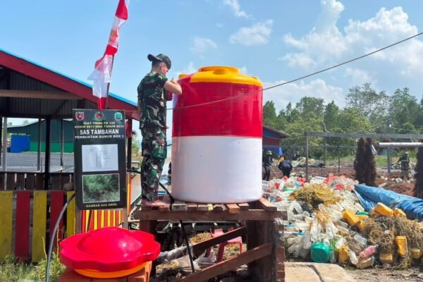 Sinergi Antara TNI dan Masyarakat di Penutupan TMMD Desa Liang Bunyu